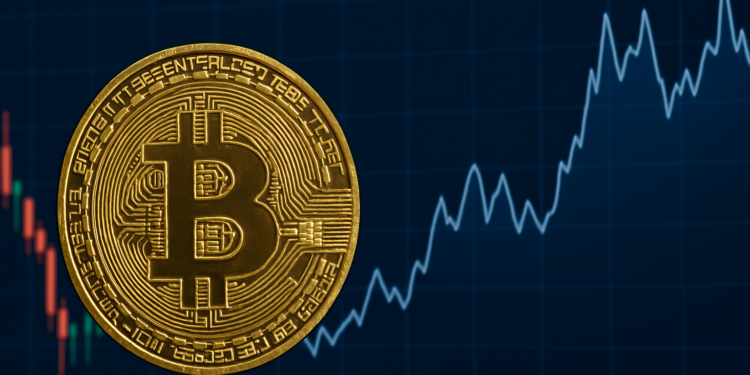 a gold coin with a bitcoin sign on a graph